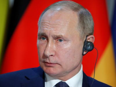 Владимир Путин на пресс-конференции по итогам встречи лидеров "нормандского формата". Фото: Charles Platiau/Reuters